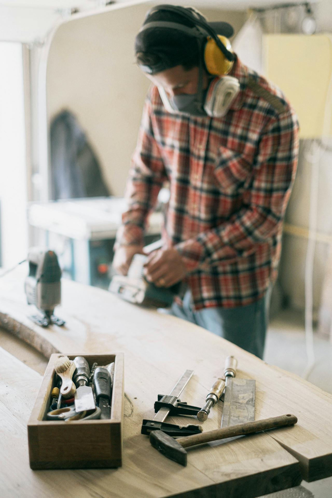 business owner working with hand tools